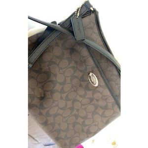 Coach satchel. Adjustable strap.